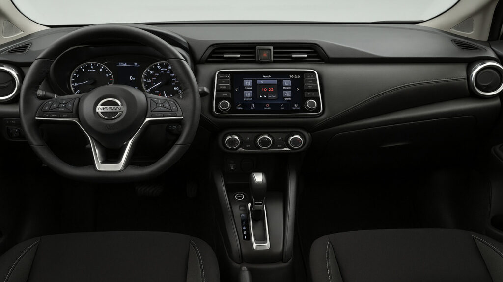 2025 Nissan Versa interior dashboard with touchscreen, steering wheel and controls